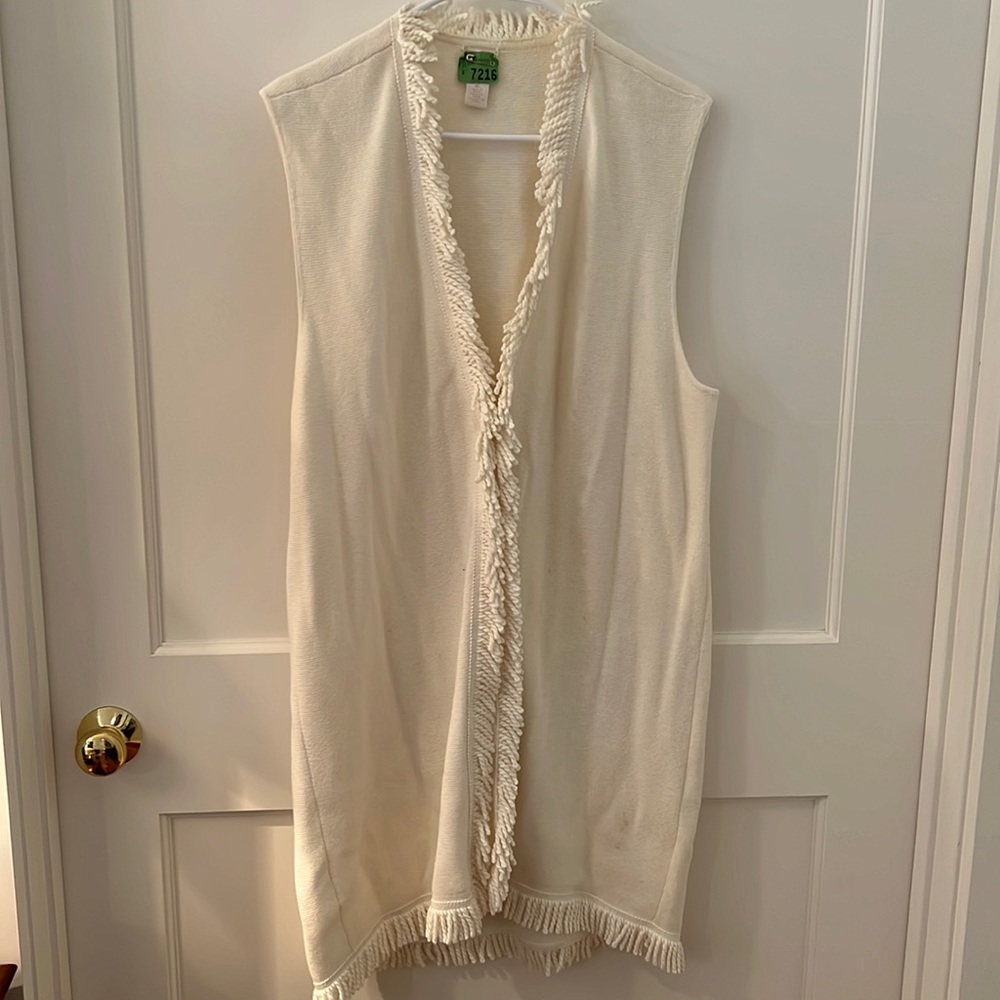 Beautiful cream sleeveless fringed cardigan